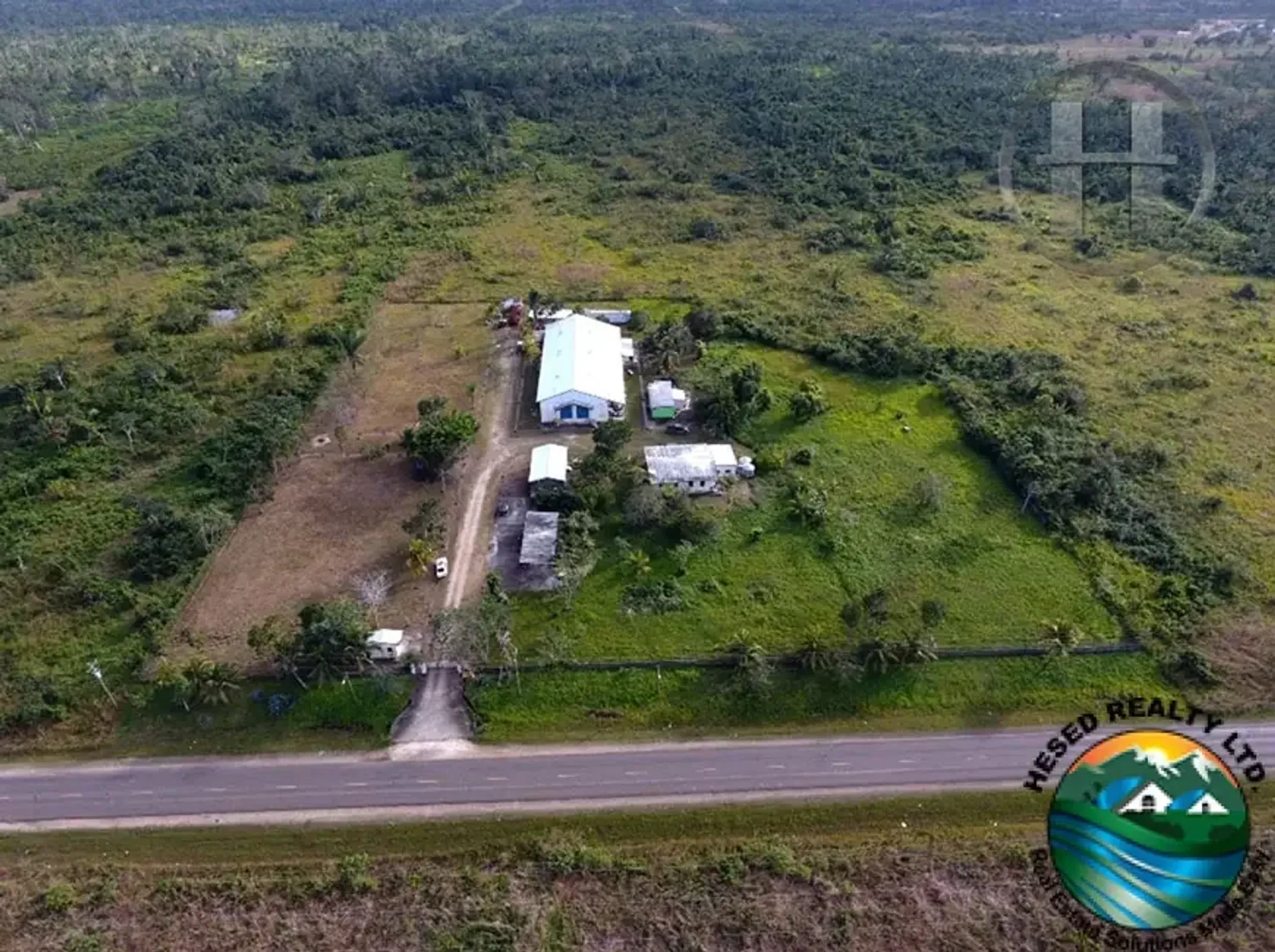 20-Acre Commercial Property with Warehouse and Four Buildings, Belmopan City Limits