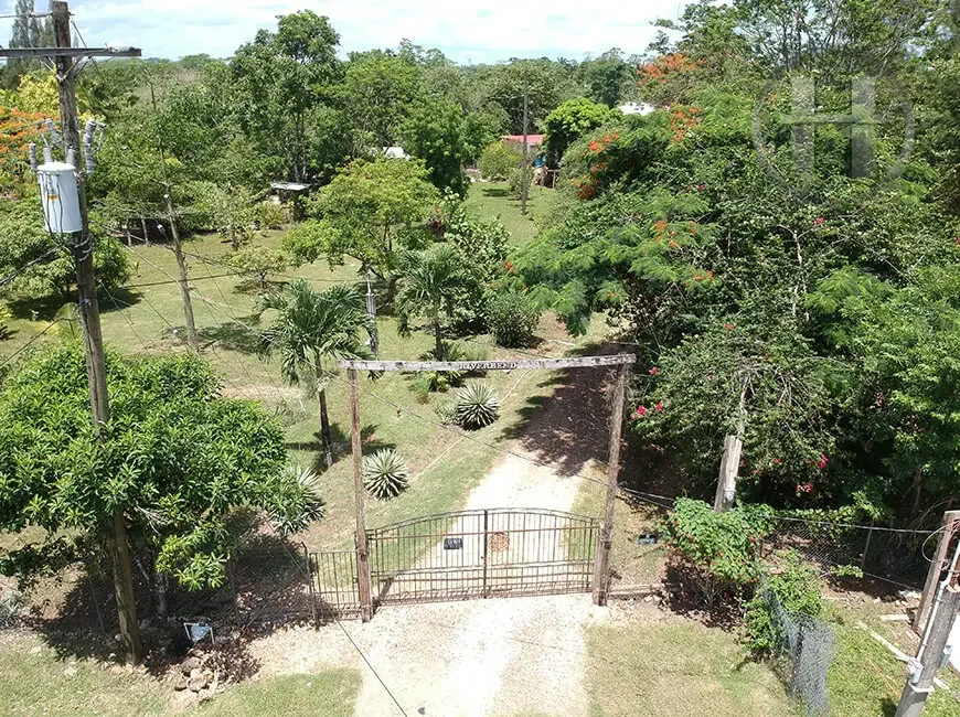 2-Bed Riverfront Home with Screened Deck and Fruit Orchard on 2.12 Acres near Belmopan