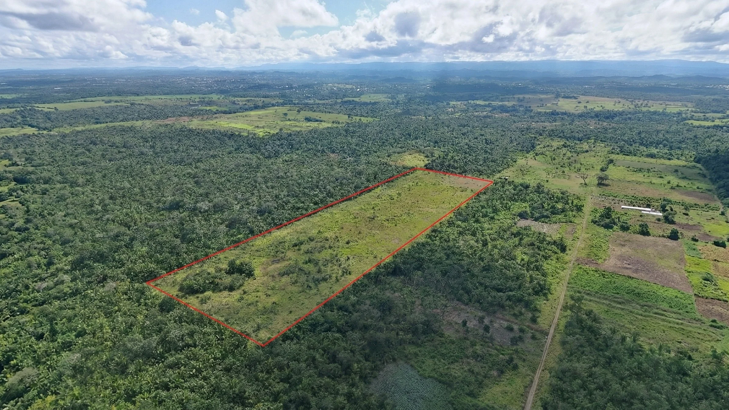 25-Acre Cleared Fenced Land with Pond and Belize River Access, Spanish Lookout