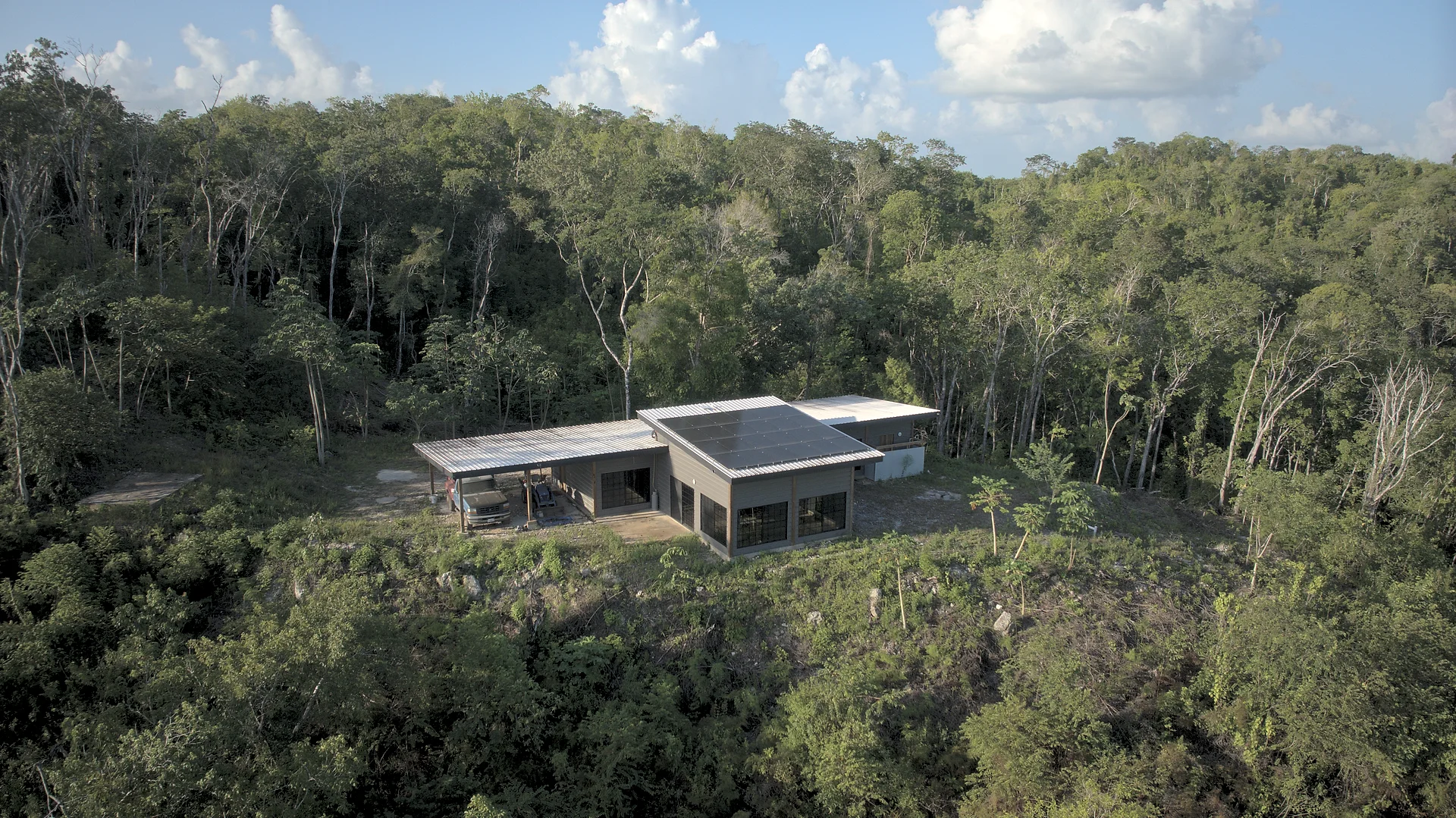 18-Acre Producing Fruit Farm with Off-Grid Hilltop Home in Unitedville, Cayo