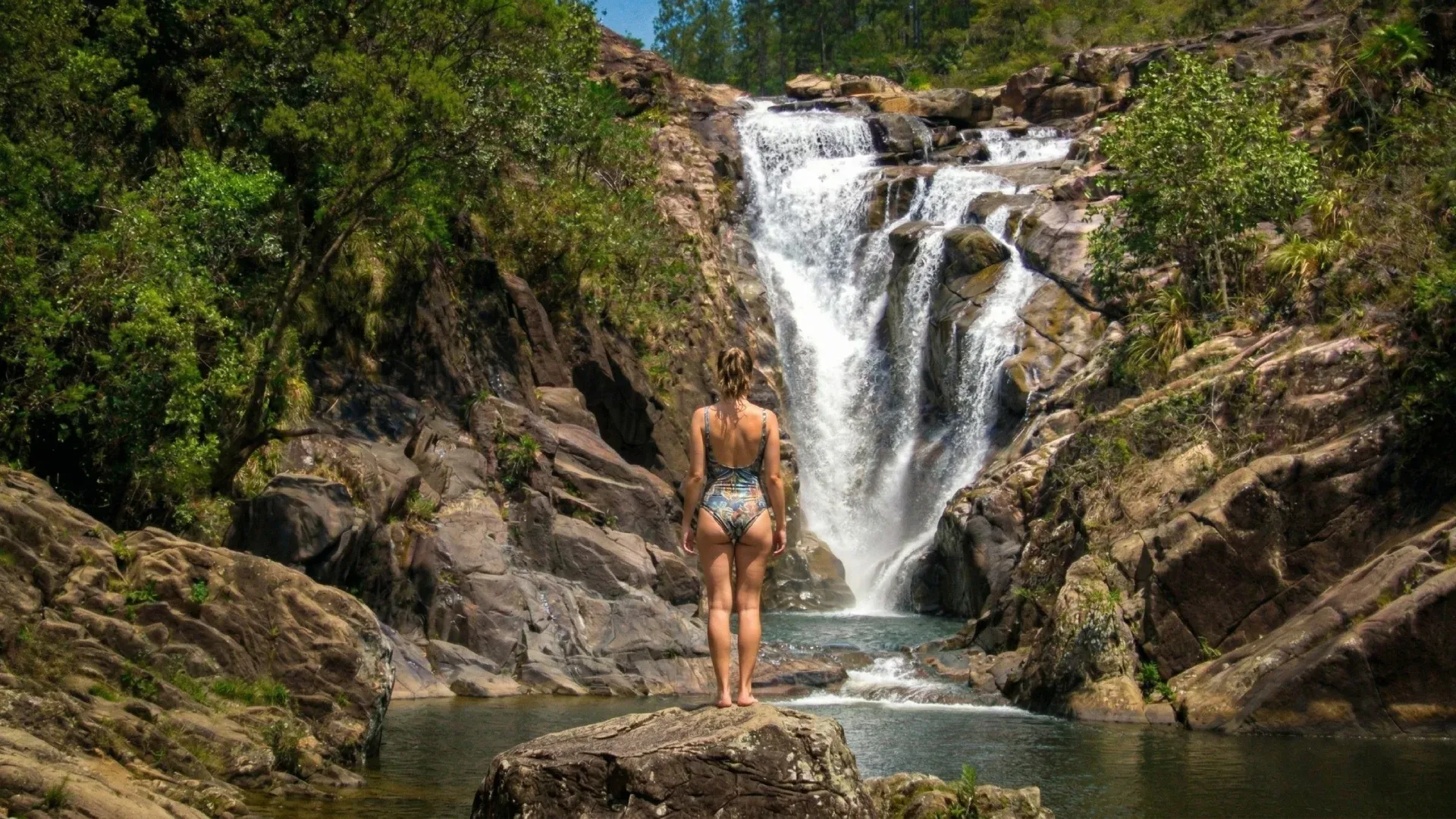 Jungle-covered hills and river valley in Cayo District, western Belize — land and property for sale