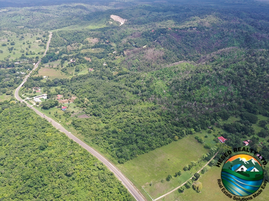 Close-up aerial view of the highway frontage for the 118-acre parcel, emphasizing visibility and access.