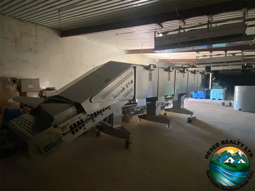 Cooker machine used in the shrimp processing facility at Aqua Mar property in Independence Village