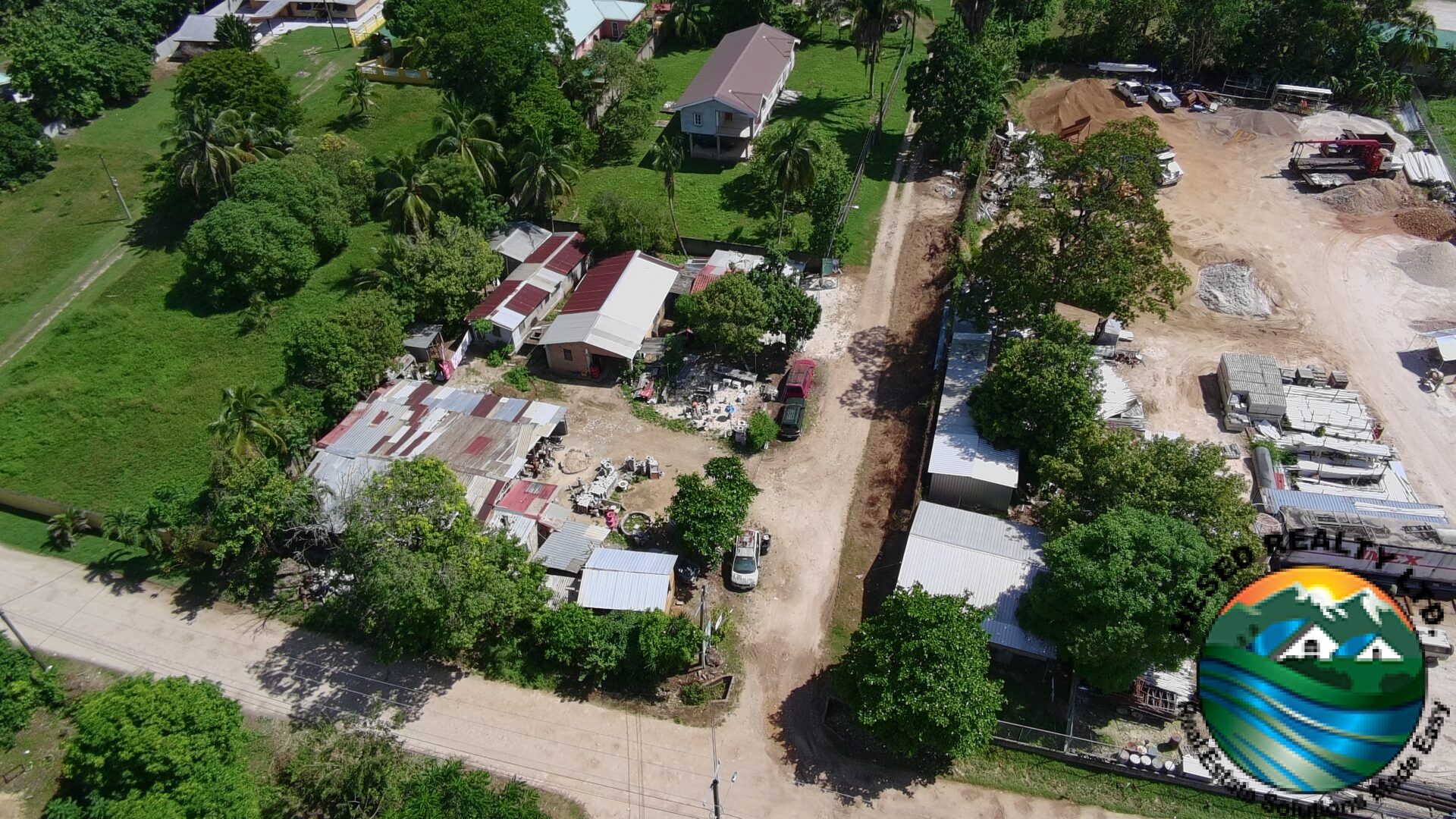 Drone photo showcasing the left side of a commercial lot near Forest Drive in Belmopan.