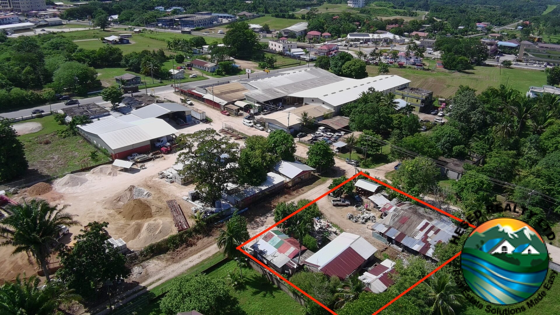 Drone photo focusing on the right side of a commercial property near Forest Drive.